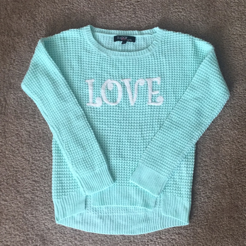 Knit long sleeve mint green sweater.